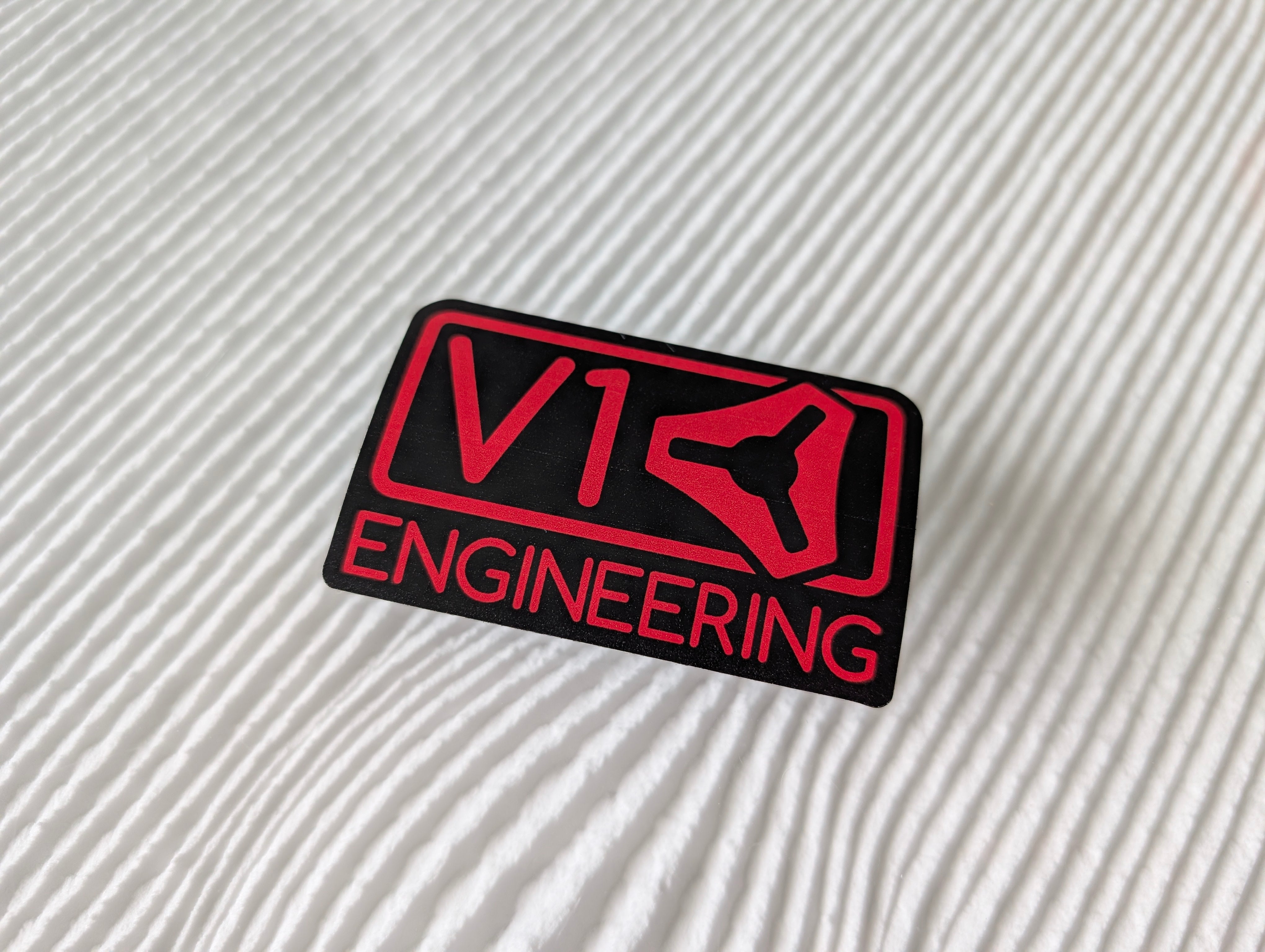 Magnet, V1 Engineering logo – V1 Engineering Inc